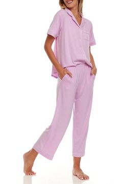 A matching pajama set ensures even your bedtime wardrobe is chic! 26" length; 11" rise, 26" inseam (size Small) Top has front button closure; notched collar; short sleeves Pants have elastic waist 62% polyester, 33% rayon, 5% spandex Machine wash cold, tumble dry Imported Comfortable Relaxed Fit Pajama Party Sets, Pink Daywear Set With Long Pants, Relaxed Fit Short Sleeve Pant Set For Loungewear, Cotton Short Sleeve Pant Set For Loungewear, Cotton Short Sleeve Loungewear Pant Set, Short Sleeve Cotton Pant Set For Loungewear, Relaxed Fit Sleep Set With Long Pants, Pink Relaxed Fit Sets For Daywear, Bedtime Sets With Relaxed Fit Long Pants