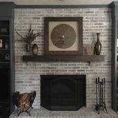 a living room filled with furniture and a fire place