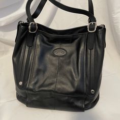 This Tod’s Bag Is Great For Everyday Use. Store All Your Essentials Here! Unused And Comes With A Shoulder Strap. Timeless Black Shoulder Bag With Handles, Timeless Black Top Handle Hobo Bag, Timeless Black Hobo Bag, Waxed Canvas Tote Bag, Black Bucket Bag, Tods Bag, Leather Tote Bag Women, Black Bucket, Suede Tote