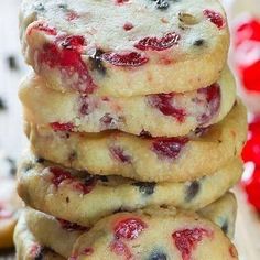 a stack of cookies sitting on top of a wooden table