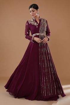 Wine full sleeves flared attached cancan gown with floral bloom embroidery using sequin, cutdana, pearl, dabka, zardozi highlights on the yoke, waistband and heavily embroidered drape. - Aza Fashions Anarkali Sequin Gown For Diwali, Long Sleeve Anarkali Set With Mirror Work For Reception, Diwali Anarkali Gown With Sequins, Hand Embellished Bollywood Gown For Formal Events, Sequin Gown For Eid Reception, Bollywood Style Hand Embellished Formal Gown, Bollywood Hand Embellished Formal Gown, Semi-stitched Sequin Dress For Reception, Anarkali Gown With Sequins For Wedding