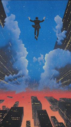 a man flying through the air over a city