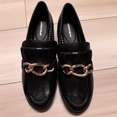 Never Worn! Super Comfy And On Trend For Fall Loafer Chain Strap Loafers With Round Toe For Work, Trendy Office Loafers With Chain Strap, Chic Office Loafers With Chain Strap, Black Chain Strap Loafers For Work, Elegant Loafers With Chain Strap And Round Toe, Black Loafers With Chain Strap And Round Toe, Luxury Timeless Slip-on Tassel Loafers, Luxury Semi-formal Tassel Loafers With Rubber Sole, Elegant Black Slip-on Tassel Loafers