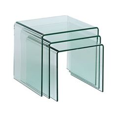 three clear glass nesting tables on white background