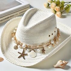 A dream beach hat #Cowgirl #HatStraw #HatBeach #AccessoriesSeashell #HatStarfish #HatPearl #HatCoastal #StyleBeach #FashionSummer #HatBeach #Charm #HatWestern #StyleBoho #ChicVacation #StyleCoastal #AccessoriesTrendy #HatHat #PhotographyStylish Beach Cowgirl, Cowgirl Hat, Dream Beach, Hat Ideas, Seashell Crafts