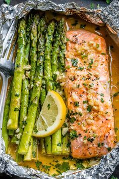 salmon, asparagus and lemon in foil with the words best food on it