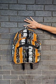 Natural African Print Bag, African Print Backpack, Funky Backpack Super colourful African print backpack made with a stunning mud-cloth style print. This high-quality backpack is the perfect size for a laptop and books with two front zipped compartments for all your little things. It would also be the ideal school bag for kids who love patterns!  - Mud-cloth style fabric - Lined for extra strength  - Two front pockets and main compartment - Adjustable straps - Made from cotton fabric - Machine w Orange Backpack For Everyday Use And Back To School, White Backpack For Trips, White Standard Backpack For Trip, Orange Bags For Back To School, Orange Standard Backpack For School, Orange School Backpack, Handmade Multicolor Standard Backpack, Orange Backpack For Daily Use, Bohemian Style Handmade Multicolor Backpack