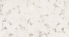 a white marble counter top textured with black and grey speckles on it