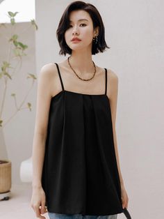 This is a feminine and romantic top by LANGSON that is made out of high quality viscose, nylon, and spandex blend fabric. With design detail of loose silhouette and sleeveless design, it gives a trendy and feminine look. - Sleeveless design- Relaxed silhouette- Feminine and modern mood Romantic Tops, Feminine Look, Design Details, Fabric, Black, Design