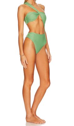 Oblique Cutout One Piece BikiniGet ready to make a statement with our Oblique Cutout One Piece Bikini. This swimsuit features a unique design with oblique cutouts on both sides, creating a stylish and bold look that's sure to turn heads.Whether you're lounging by the pool or taking a dip in the ocean, you can feel confident and comfortable in this swimsuit. The high-quality fabric is stretchy and soft, providing a perfect fit and allowing for easy movement.Key Features: Unique oblique cutout des