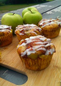 apples and cinnamon muffins on a cutting board