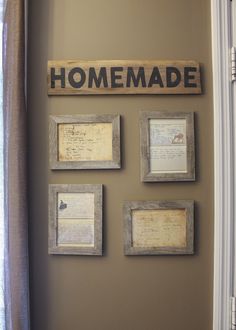 the wall is decorated with framed pictures and letters that spell out home made on it