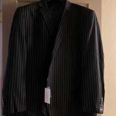 This Is A Brand New 3 Piece Suit With Vest. It Is The Wrong Size For My Husband And Has Been Sitting In The Box. The Suit Is 56r And The Pants Are 50 Waist. The Pants Are Not Hemmed (Since The Suit Is New) So They Can Be Tailored To The Length You Need. Striped Notch Lapel Business Sets, Business Striped Notch Lapel Sets, Striped Business Sets, Classic Striped Formal Sets, Striped Fitted Long Sleeve Suits, Striped Fitted Long Sleeve Sets, Classic Fitted Pinstripe Sets, Elegant Striped Fitted Sets, Elegant Fitted Striped Sets