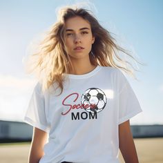 Score big laughs and style points with our Soccer Futbol Mom Tee! This Stylish Motherhood Shirt is more than just Sporty Mom Life Apparel--it's the perfect blend of comfort and kickin' it on the sidelines with a touch of trendy football fan flair. The ideal gift for Soccer Moms who tackle goals and tantrums with equal finesse! This classic unisex jersey short sleeve tee fits like a well-loved favorite. Soft cotton and quality print make users fall in love with it over and over again. These t-shirts have-ribbed knit collars to bolster shaping. The shoulders are tapered for a better fit over time. Dual side seams hold the garment's shape for longer.  .: This t-shirt comes with a lightweight fabric (4.2 oz/yd² (142 g/m that is easy to layer thanks to its breathability and the perfect choice f Relaxed Fit Letter Print T-shirt For Football Season, Casual Sublimation Design For Football Season, Casual Sports Sublimation Design With Letter Print, White Casual T-shirt For Football Season, Casual White T-shirt For Football Season, White Sports Fan T-shirt Relaxed Fit, White Relaxed Fit Sports Fan T-shirt, White Relaxed Fit T-shirt For Sports Fans, Casual Football Season Sublimation Design