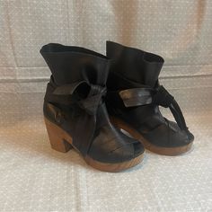 Very Good Condition - No Stains Or Flaws. Black Platform Clogs For Fall, Spring Leather Clogs With Wrapped Heel, Leather Clogs With Wrapped Heel And Closed Toe, Leather Closed Toe Clogs With Wrapped Heel, Black High Heel Clogs With Leather Sole, Leather Open Toe Clogs For Fall, Black Platform Clogs Medium Width, Black Booties With Stacked Block Heel, Fall Leather Platform Clogs