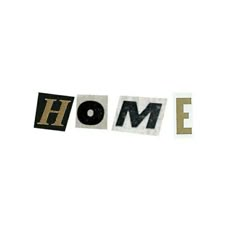 the word home spelled in cut out letters on a white background with black and gold accents