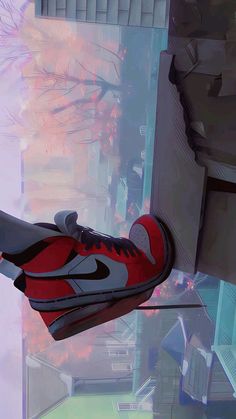 a pair of red sneakers hanging from the side of a high rise building in an animated city