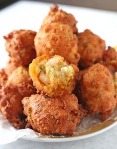 some fried food is on a white plate