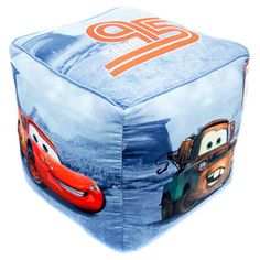 this is an image of a blue square poufce with cars printed on it