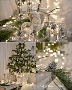 christmas decorations are displayed on the table with lights and pine branches in front of them