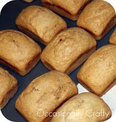 freshly baked muffins sitting on top of a black surface with the words ocean simply crafty