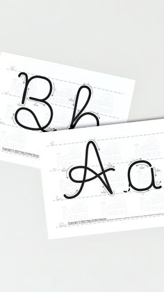 two black and white business cards with the letters b and a on them, one is folded in half