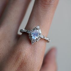 Celestial Moonstone Ring With Diamond Halo, Heirloom White Gold Diamond Moonstone Ring, Heirloom Moonstone Ring In White Gold With Diamonds, Luxury Moonstone Halo Ring For Wedding, Timeless White Gold Moonstone Ring For Wedding, Timeless White Gold Moonstone Wedding Ring, Morganite Engagement Ring Rose Gold, Interlocking Ring, Rose Gold Morganite