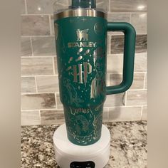 a starbucks cup is sitting on top of a blender