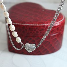 Style: Female Material: Titanium Steel, Freshwater Pearl Pearl Type: Cultured Pearl Color: White Pearl Shape: Irregular Necklace Length: 42+5cm Bracelet Length: 17+5cm Pendant: 1.5*1.6cm Half Pearl Half Chain Necklace Silver, Heart-shaped Pearl White Jewelry With Pearl Chain, White Heart-shaped Necklace With Pearl Chain, White Heart-shaped Pearl Chain Necklace, White Multi-strand Pearl Chain Necklace, Pearl Types, Pearl Color, Heart Pendant Necklace, Pearl Ring