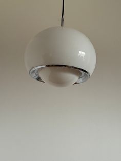 Meblo Guzzini Pendant Light / Vintage  White Ceiling Lamp / Mid-Century Modern Lighting / Home Decor / Italy / 1970s Step back into the stylish 1970s with this iconic ceiling light designed in 1968 by Studio 6G model 3030 for Harvey Guzzini. Crafted in white Plexiglas with an exquisite decorative white metal ring, this hanging lamp exudes midcentury modern charm. Elevate your home decor with this vintage piece that brings a touch of retro elegance to any space, perfect for enhancing kitchen ligh Chandelier Bauhaus, Vintage Lamps Flos Snoopy, 70s Lamp Hanging, Meblo Guzzini Lamp, Mid Century Lighting Pendant, Ceiling Lamp White, Vintage 70’s Chandelier, Kitchen Lamps, Mid Century Modern Lighting