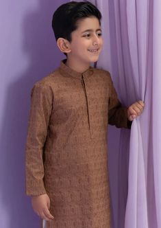 Straight Kurta Straight kurta with schifli embroidery. Hidden placket with stitching details. Colour: Brown Fabric: Cambric Traditional Tops With Dabka For Eid, Traditional Brown Festive Tops, Festive Traditional Brown Tops, Festive Brown Traditional Tops, Brown Sets With Resham Embroidery And Long Sleeves, Brown Long Sleeve Sets With Resham Embroidery, Brown Straight Kurta For Eid, Brown Cotton Kurta With Dabka, Festive Long Sleeve Brown Kurta