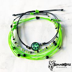 YOU CAN NOW SHOP ON MY NEW WEBSITE! www.summerstylebracelets.com This I Come in Peace Alien wax cord bracelet pack is the perfect gift for the out of this world, alien lover in your life! The beaded bracelet also glows in the dark! Completely waterproof, adjustable so it will fit any size wrist. Just pull to close. All of my friendship bracelets are made with 100% cotton embroidery floss & my water proof jewelry is made with 100% waxed polyester cord. Any other supplies I use are all natural & eco friendly & everything is made in a smoke-free & pet-free home! Green Beaded Bracelets For Summer Festivals, Green Friendship Bracelets For Summer Gift, Green Summer Friendship Bracelets As Gift, Green Braided Bracelets As Summer Gifts, Green Braided Bracelets For Summer Festivals, Green Braided Bracelet For Summer Festival, Summer Festival Green Beaded Bracelets, Adjustable Green Friendship Bracelets For Summer, Handmade Green Friendship Bracelets For Summer