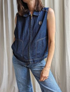 Women's vintage bue denim vest vintage, oversized waistcoat, collared cropped top.  Size: XL (model UK 12, EUR 40, US M) Brand: Escada Year: 1990s Vintage condition: great 100% Recycled Packaging: All items are carefully wrapped in tissue paper, tied with natural jute string and shipped in eco-friendly mailing paper bags for recycle. We may use plastic bags only for international shipping to protect items during longer transit. Shop Policies:  Ship in 1-3 business days from London, UK via Royal Mail 48 hours tracked. Cancellation within 24 hours are accepted. We gladly accept returns. All return shipments must be postmarked within 14 days of the purchase date. Boretrolondon is not responsible for return shipping costs unless the item has a default that wasn't described in the listing, in t Cheap Denim Blue Workwear Vest, Oversized Waistcoat, Boho Bracelets Stack, Jean Vest, Women Rising, Sleeveless Jacket, Plastic Bags, Natural Jute, Paper Bags