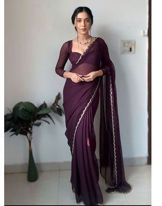 Type:
Saree


Saree Color:
Dark Wine


Blouse Color:
Matching


Saree Length:
5.5 Mtrs


Blouse Length:
Stitched (38 Upto 42 Size)


Fabric:
Georgette


Work:
Cutwork Border


Care Instruction:
Hand Wash


Product Code:

67377 Wine Blouse, Maroon Saree, Maroon Blouse, Ready To Wear Saree, Bandhani Saree, Kanjivaram Sarees, Wear Saree, Georgette Sarees, Blouse Length