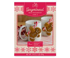 the gingerbread mugs are decorated with candy canes