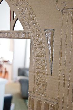 an open cardboard door that has been cut out