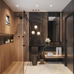 a modern bathroom with marble walls and flooring