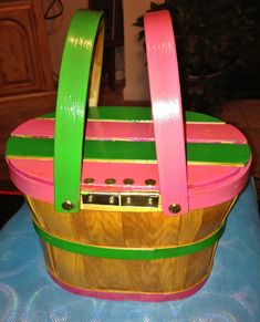 a wooden basket sitting on top of a table