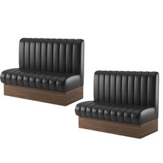 two black leather chairs with wooden bases