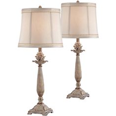 a pair of lamps sitting next to each other