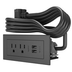 the black power strip is plugged into an electrical outlet