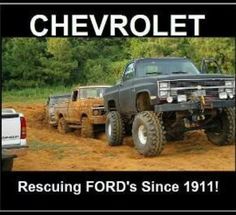 the truck is driving down the dirt road with another truck behind it that says, chevrolet rescuing ford's since 1911