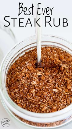 the best ever steak rub recipe in a glass bowl with a spoon sticking out of it