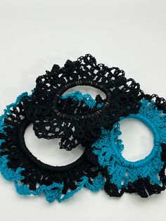 🎀Our 3 pieces of turquoise and black hair ties are gentle. They don't slide or come off, and you'll see that your ponytail remains in place the whole day minus the creasing a traditional scrunchie would provide. Dividend and softer material, fine texture, glossy and relaxing, stretchable and elastic. A more attractive look for all the girls and a creek of happiness for everyone. The best part is these hair ties won't damage your hair. Suitable for thick hair. 🎀These crochet ponytail holders are excellent hair supplements for buns, messy buns, ponytails, plaits, or pigtails. Each hair tie includes long-lasting elastic bands, smooth and comfortable to wear and fix your hair firmly. It is effortless to extract it without harming your hair. Long-lasting enough to be utilized for a long time. Turquoise And Black Hair, Black Hair Ties, Scrunchies Crochet, Crochet Ponytail, Hair Supplements, Turquoise Hair, Messy Buns, Hair Scrunchies, Ponytail Holder