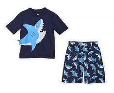 Koala Kids 2-Piece Swimsuit & Rash Guard Set Infant Boy Size 6 Months Fits 12-17 lbs., 24-27" height Navy blue swimsuit with a print of ocean sharks. The rash guard top is navy blue with a large shark printed on the front. It's little tail is sewn on the side. Excellent UPF 50 Sun Protection Brand New with Tags! I ship quickly, the same day or next day. My home is smoke free. Playful Swim Trunks For Ocean Activities, Playful Sets For Pool And Beach Season, Playful Pool Sets For Beach Season, Playful Summer Swimming Sets, Summer Swimming Sets With Short Sleeves, Blue Swimwear For Beach Season And Ocean Activities, Printed Sets For Pool And Beach Season, Playful Swimwear Set For Summer, Printed Beach Sets For Pool Season