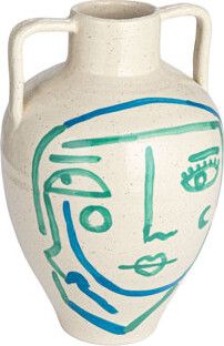 a white vase with blue and green lines on it's face, in front of a white background