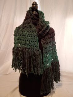 Extra long ombre forest green/black scarf wrap Width: approximately 10 in. Length: approximately 148 1/2 in. with tassels Material: 78% acrylic 22% wool Care instructions: For best results hand wash and lay flat to dry. Black Scarf, Extra Long, Forest Green, Lay Flat, Scarf Wrap, Scarf Accessory, Care Instructions, Tassels, Hand Wash