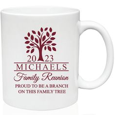 a white coffee mug with the family reunion date printed on it and a red tree