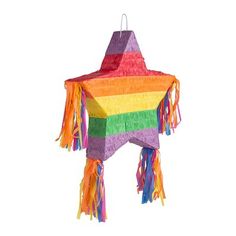 a colorful kite with fringes hanging from it's side on a white background