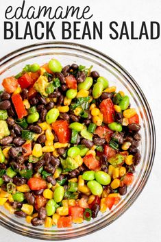 a glass bowl filled with black bean salad